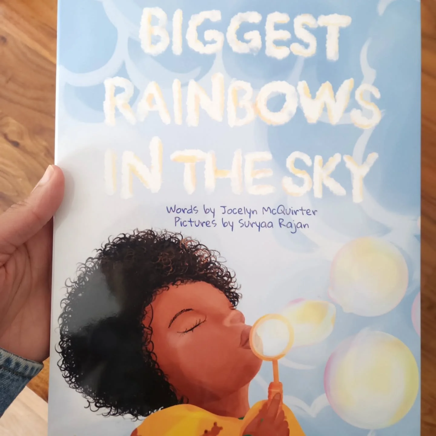 Coming soon😍 
(emoji of a smiley face with heart shaped eyes)

Oh, these timeless joy travelers 🫧 (emoji of three different sized bubbles).

Image description: a book cover titled

&quot;Biggest Rainbows in the Sky&quot;&nbsp;

Words by Jocelyn McQ