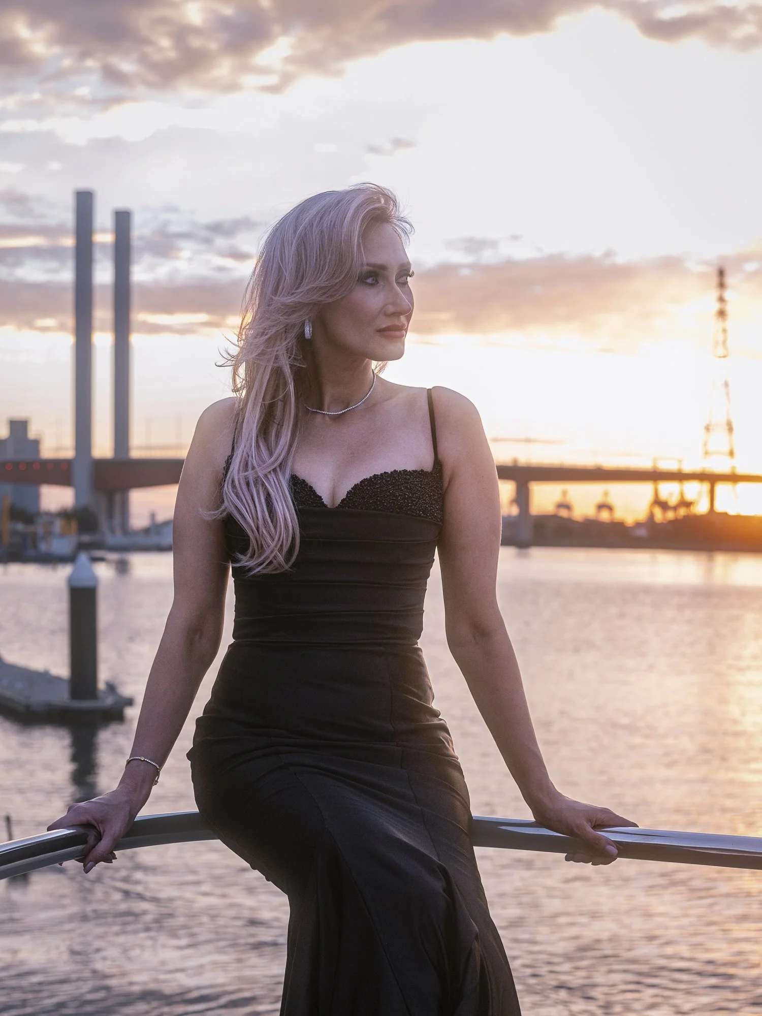 Young woman on luxury boat in Dockland Harbour, Melbourne