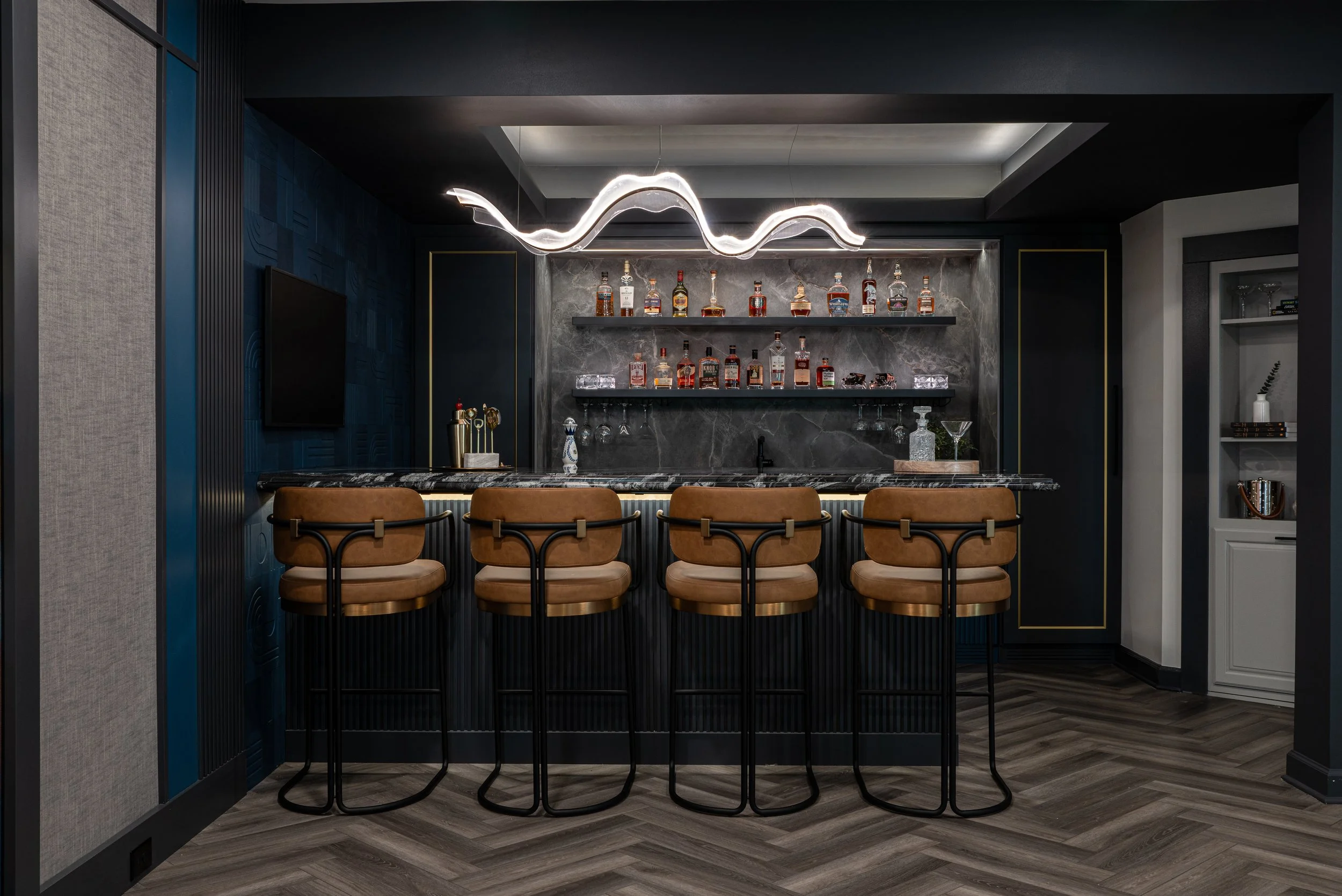 A Masterclass in Moody Design: This Howard County Basement Bar Will Change Your Home-Hosting Game