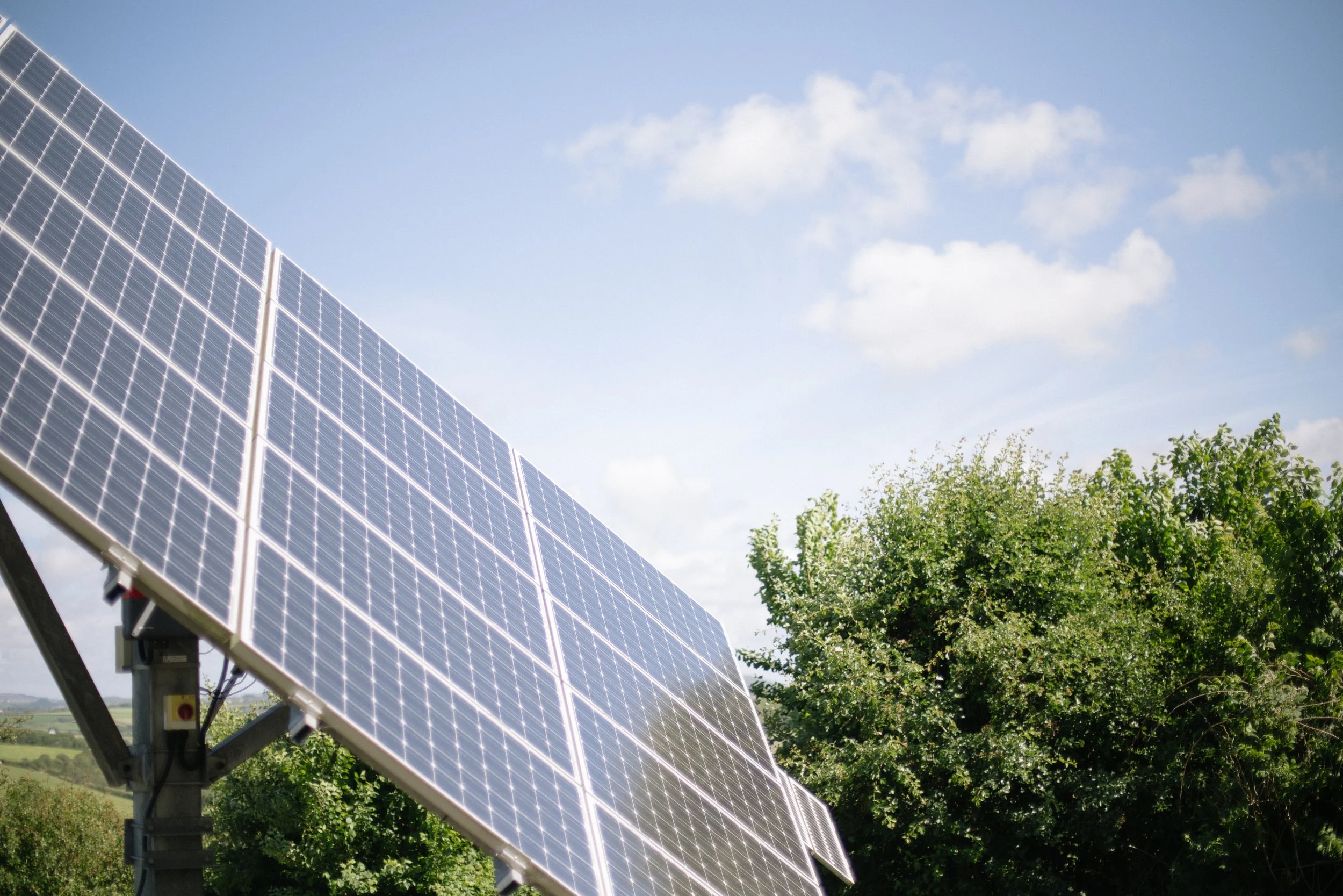 the solar array in place at atlantic distillery organically certified smallholding that generates green energy and helps to power operations by following the sun through the course of the day