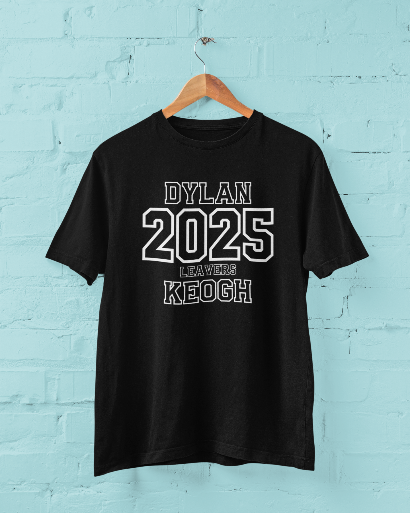 mockup-of-a-t-shirt-hanging-on-a-customizable-wall-45295-r-el2.png