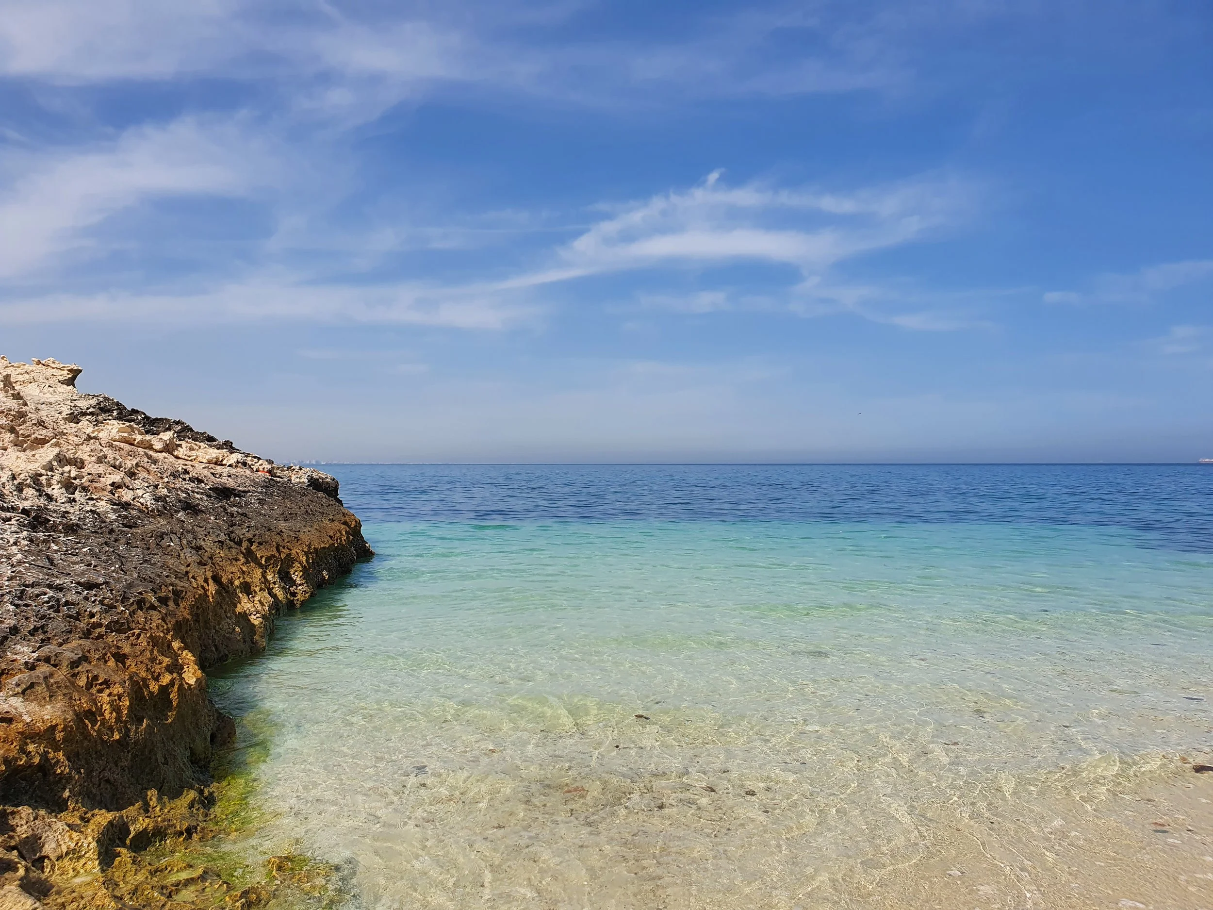 turquoise-waters-private-creek-relaxing-muscat-oman.jpg