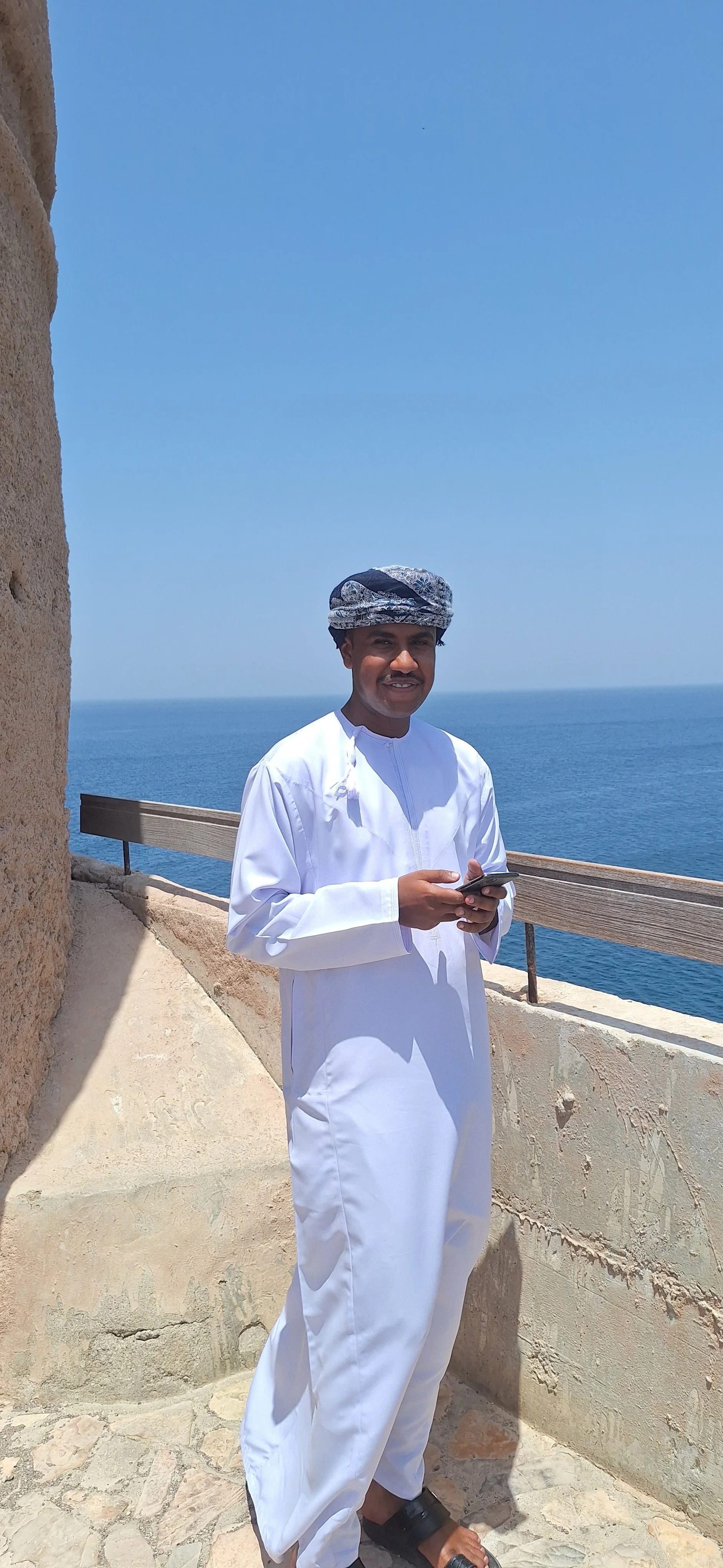 Mr. Ahmed in traditional dialy dress,