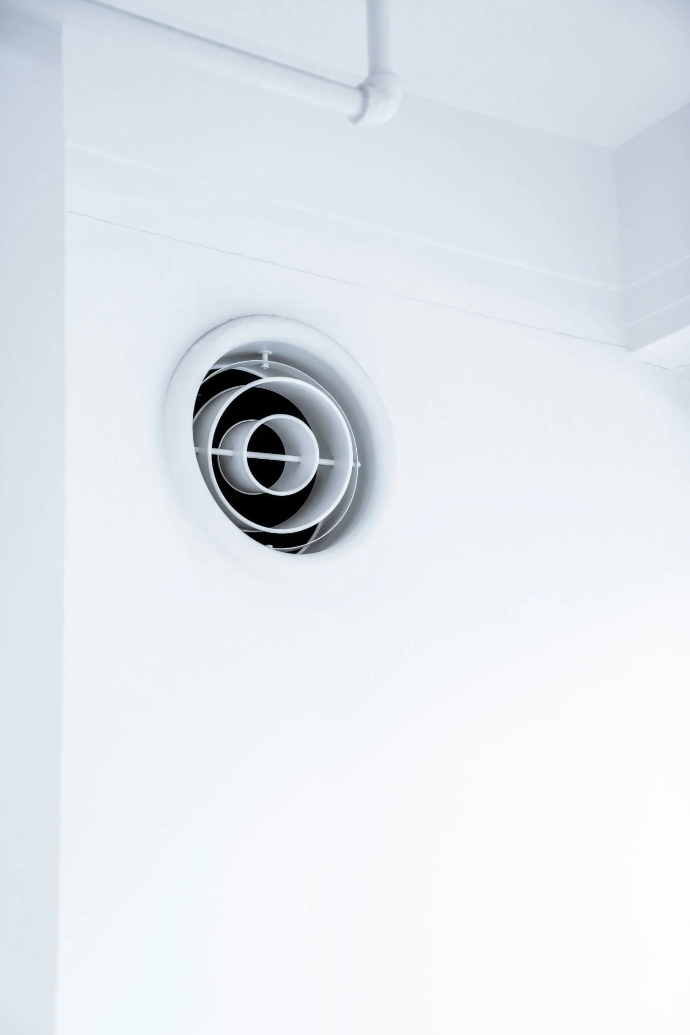 A wall opening of a mechanical ventilation duct for incoming fresh air.