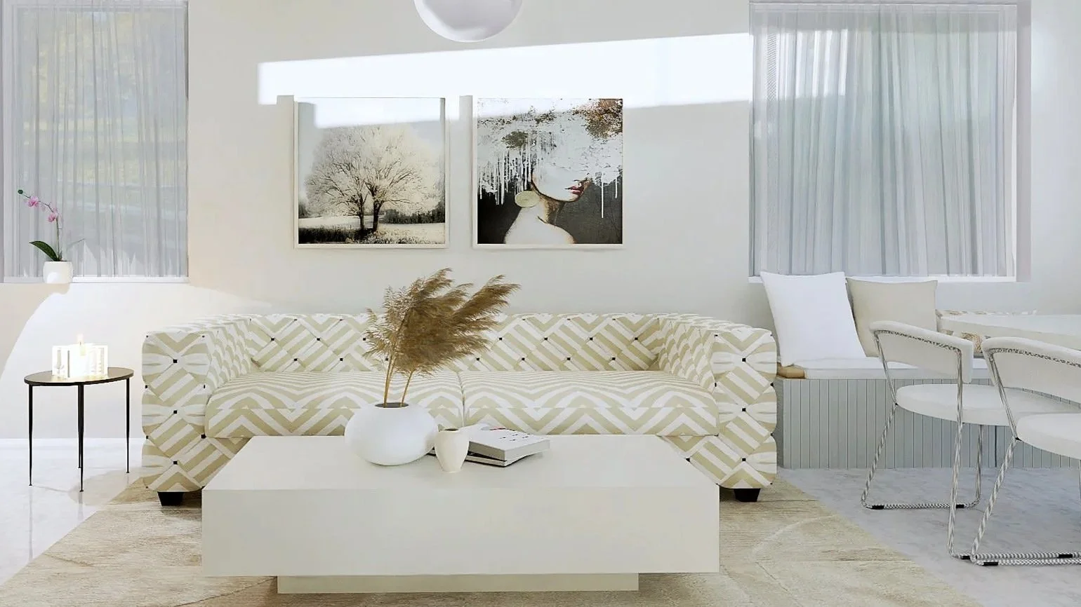 Bright living room with beige and white patterned sofa, white coffee table with decorative vase and pampas grass, side table with candles, wall art, two large windows with curtains, and white chairs.