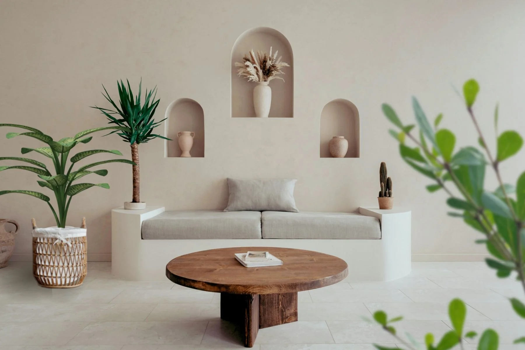 Bright interior space with natural light, greenery, and soft neutral materials creating a calm biophilic atmosphere.