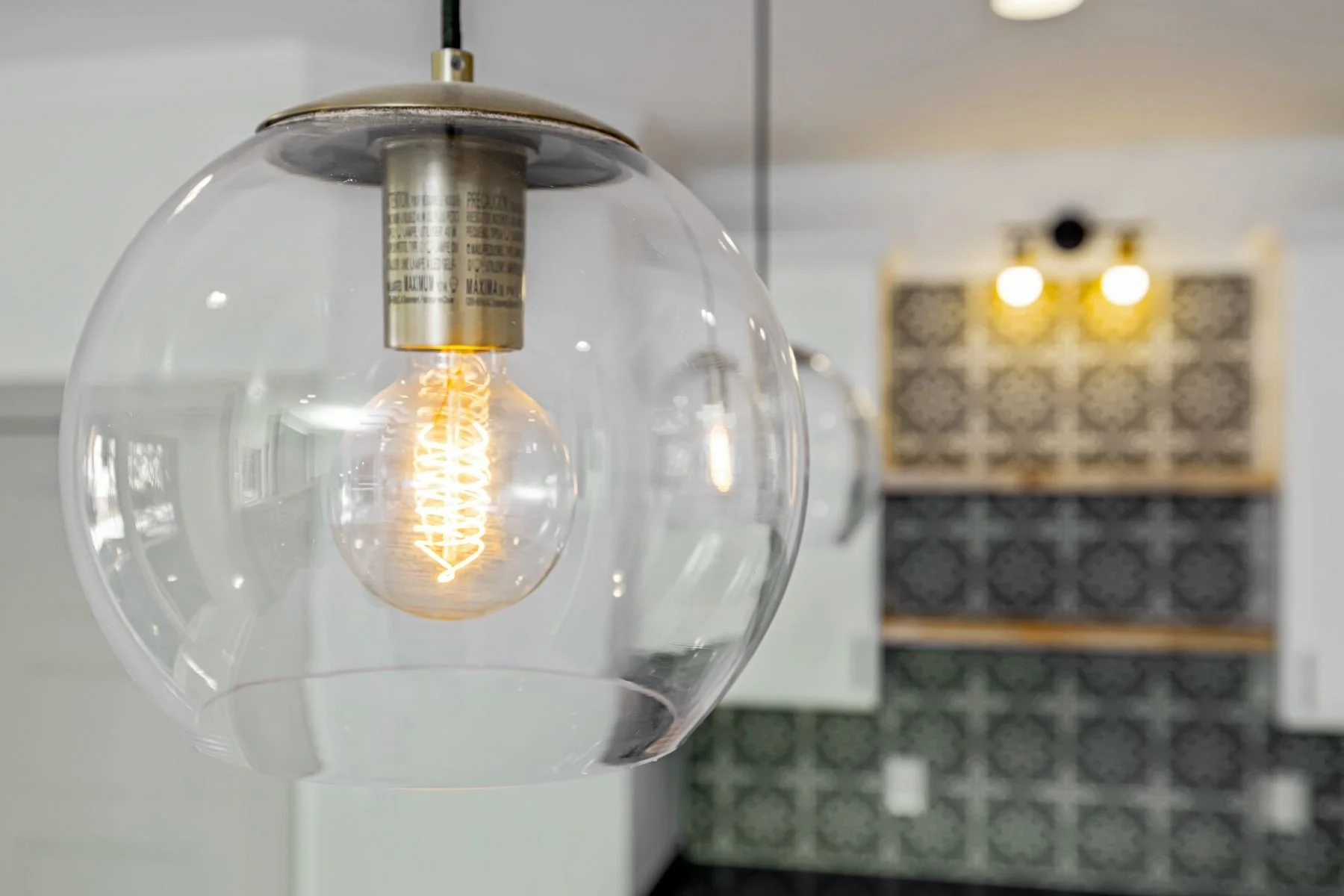 Layered lighting example with ceiling ambient light and task lighting in a home interior