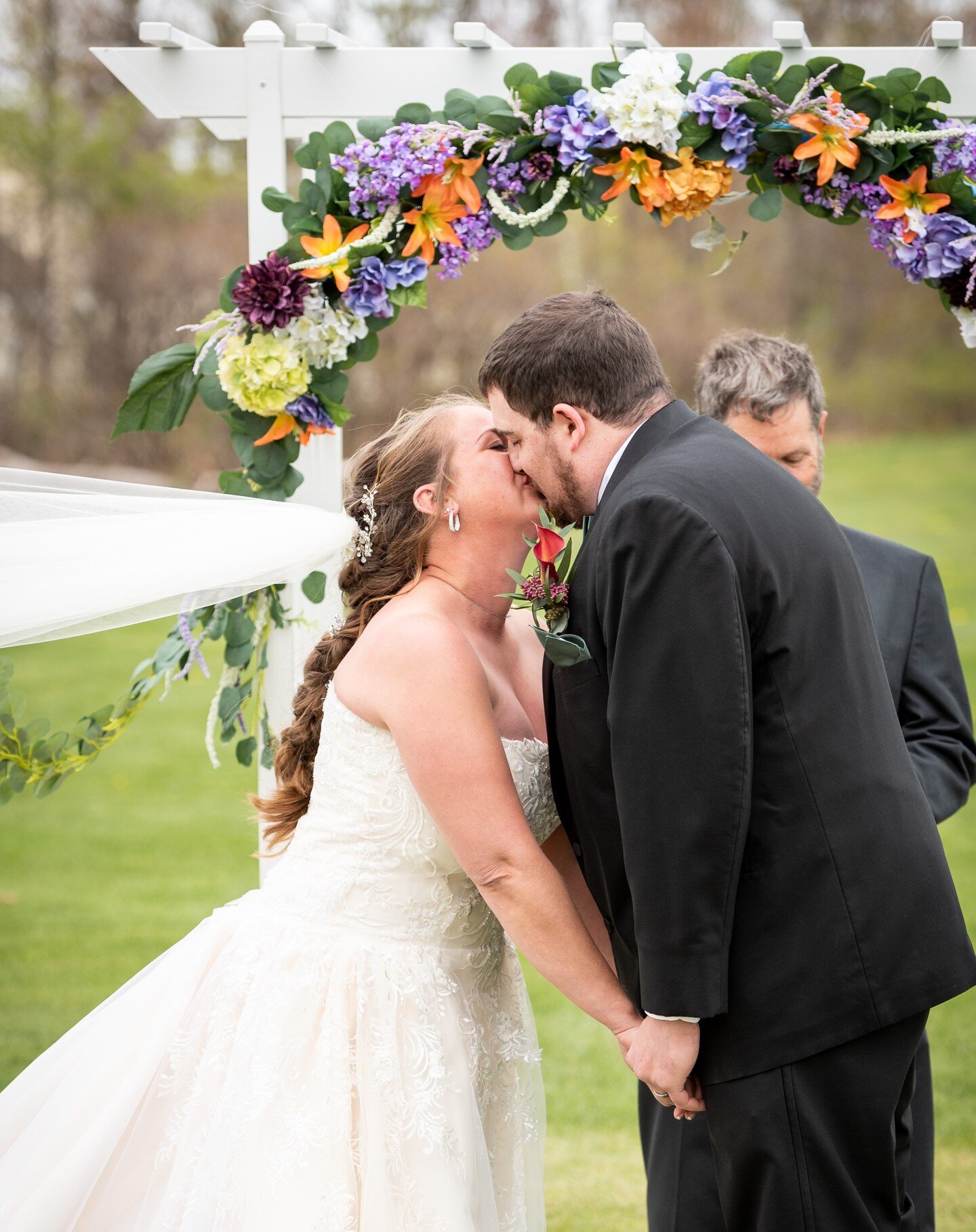 Congrats Aly and Bryan on a beautiful wedding yesterday! You were both so awesome and easy-going the whole day! #photography #wedding #weddingphotography #weddingphotographer #brideandgroom #bride #groom #firstkiss #outdoorceremony #windy #happycoupl