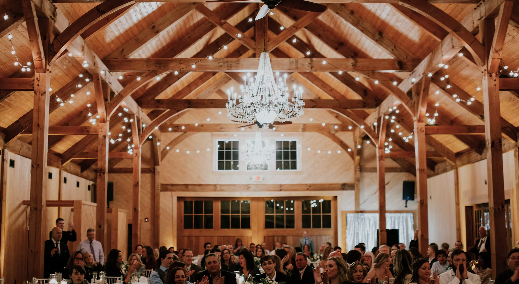 Rustic barn wedding venue in Richmond VA with exposed beams and outdoor ceremony space