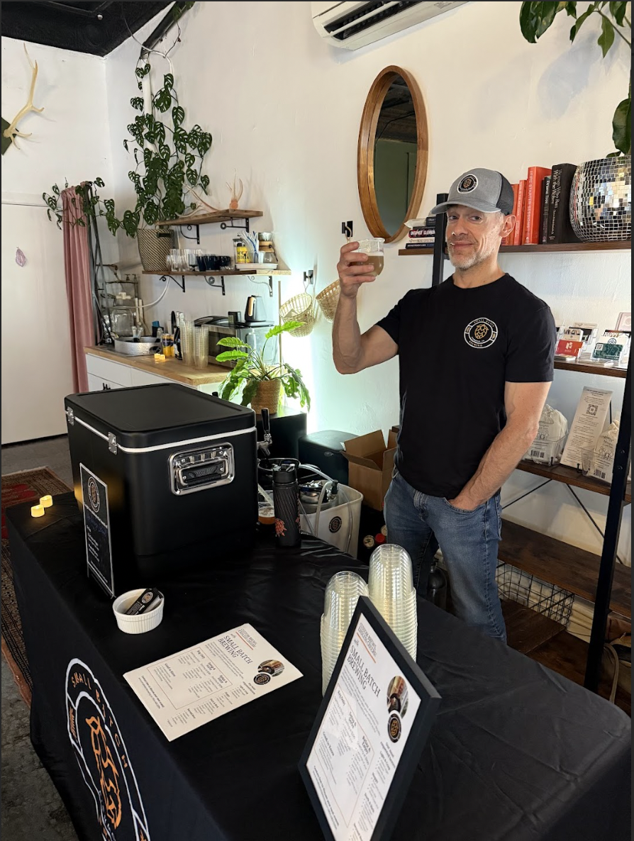 Dan Jablow, founder of Small Batch Brewing, serving craft beer at Richmond event