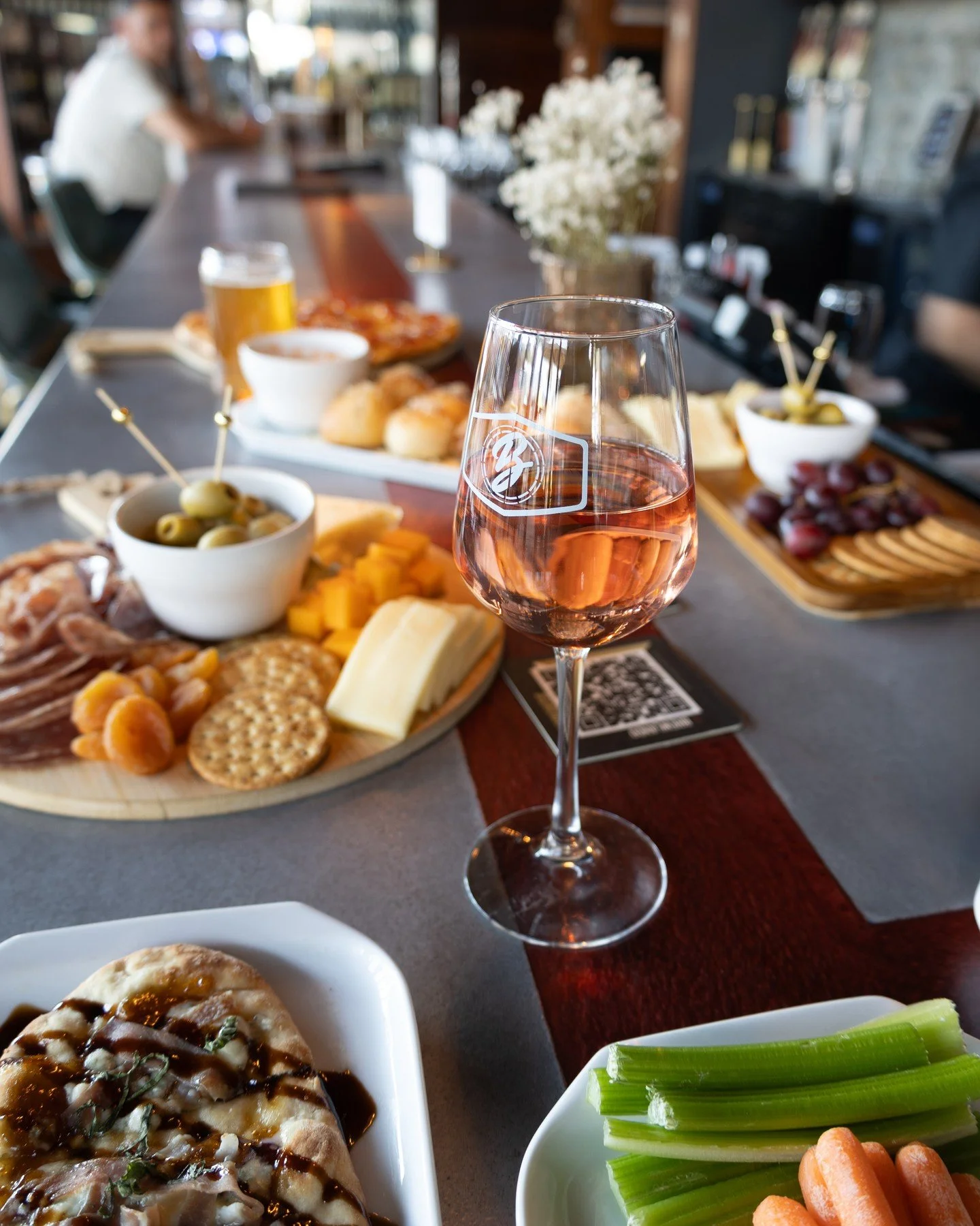 Something new is on the table. 🍷 The Winery &amp; Tasting Room by Brewlando has expanded its menu with all-new Brewlando Bites. Charcuterie Board &middot; Cheese Board &middot; Bruschetta &middot; Dev's Hummus &middot; Garlic Knots, perfect for shar