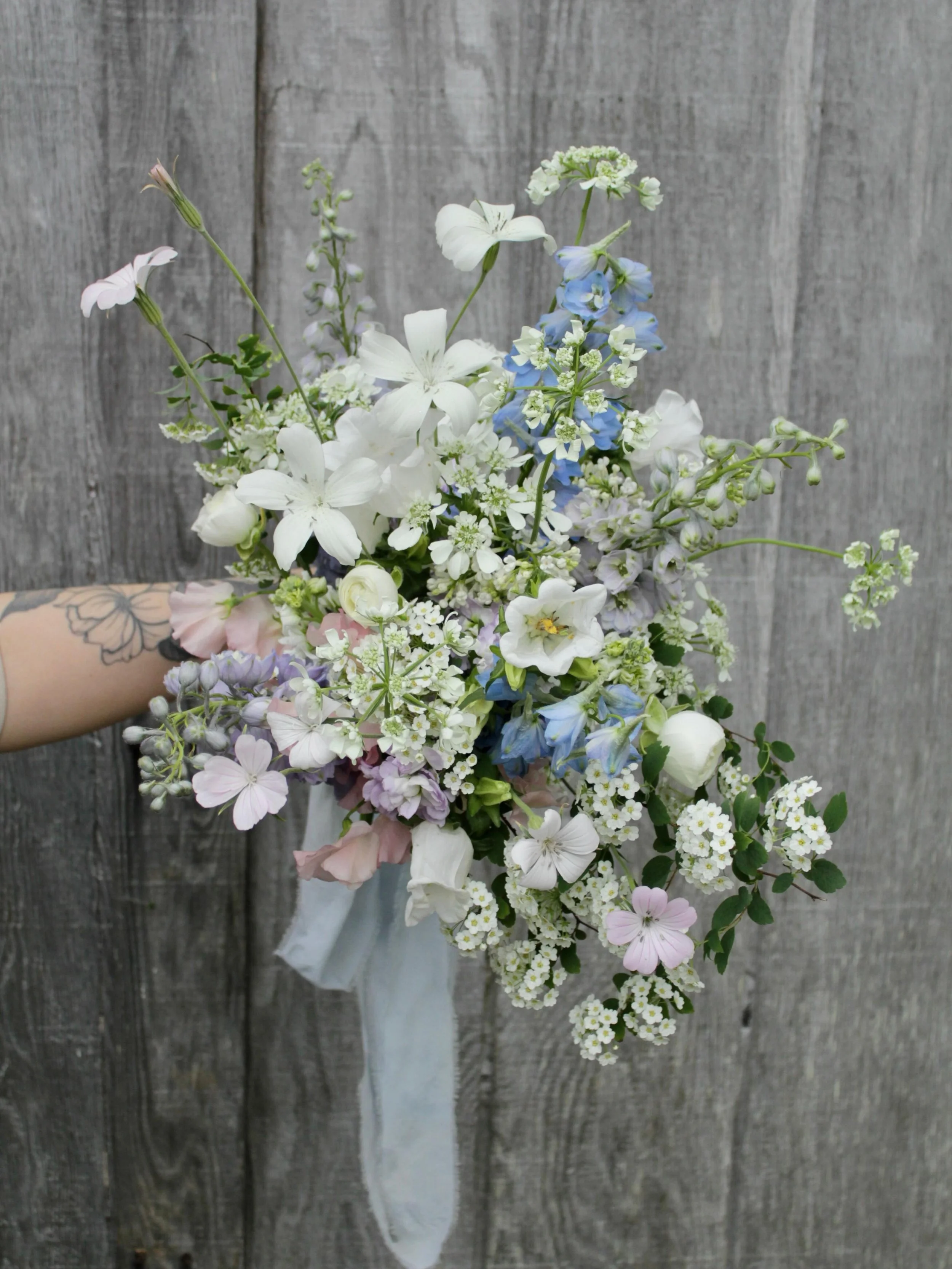 for sharon 💜 with gorgeous textural details like agrostemma, orlaya, spirea, delphinium, and more. saying goodbye to May and hello to June!

#bridalbouquet #bouquet #weddingflowers #floraldesign #maineflorist