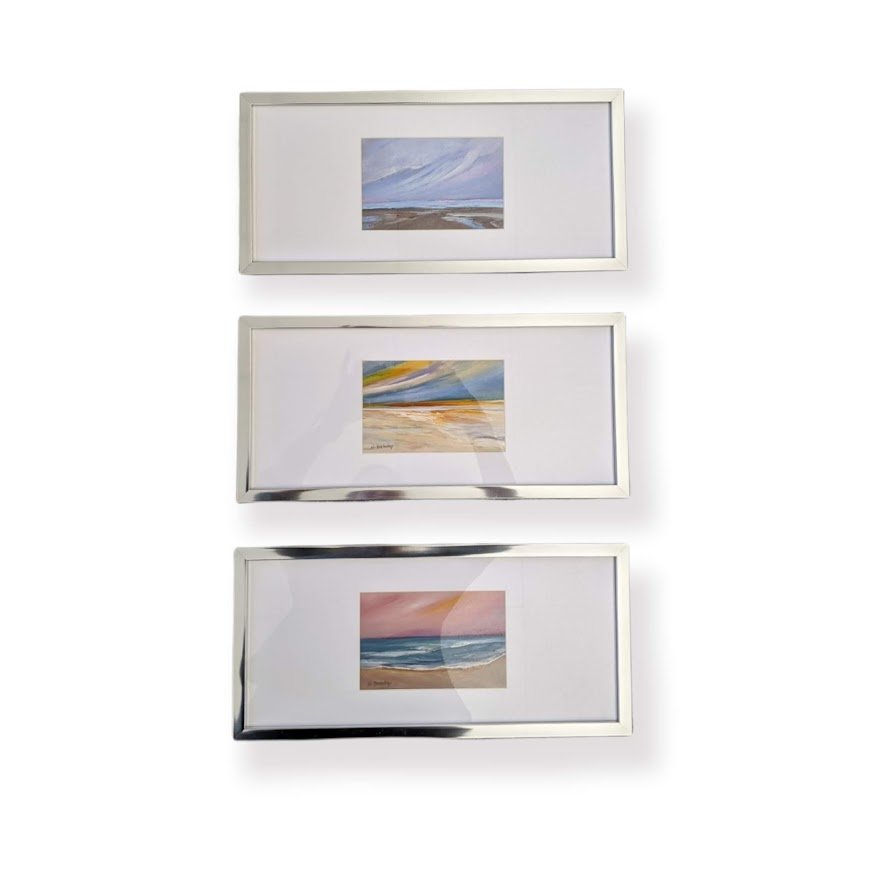 Tiro of Giclee' Seascapes in Silver Landscape Frames.jpg