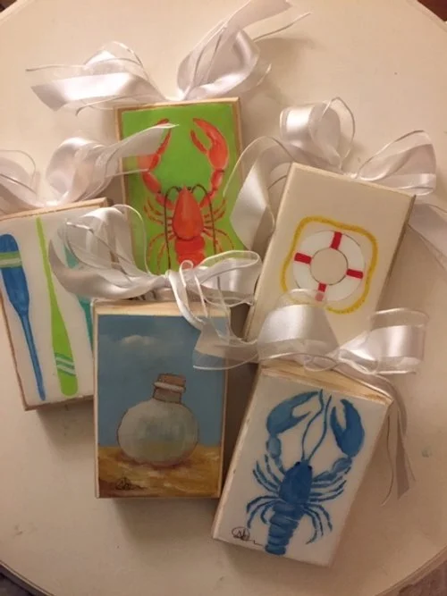 Mini Acrylic Paintings on wooden plaques, inspired by coastal living. Sealed with acrylic epoxy.
Available: Bottle in the Sand, Life Preserver. 
Email for inquiry.

Sold: Oars (sold), Orange/Red Lobster (sold), Rare Blue Lobster (sold).
