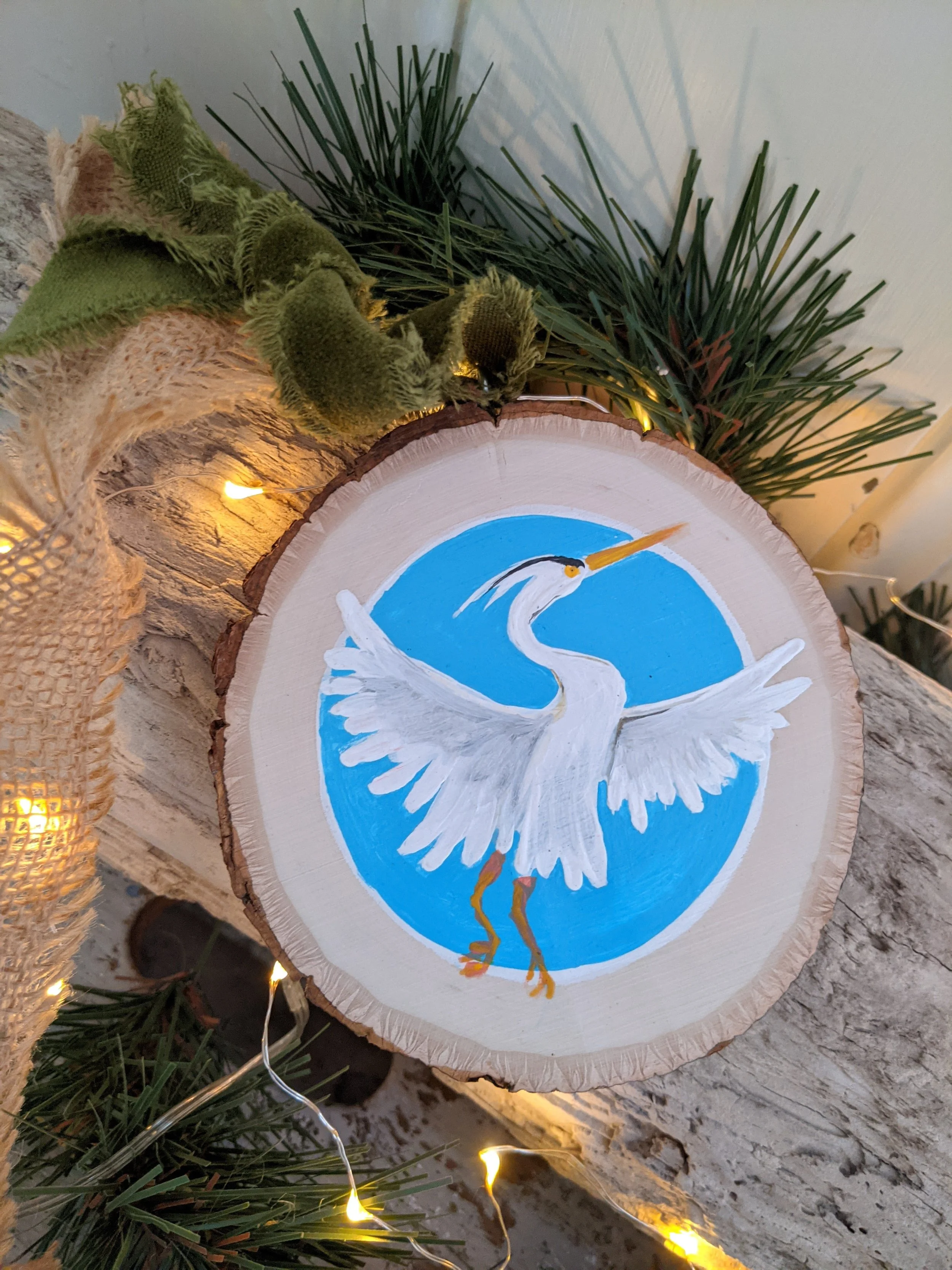 White Heron Ornament
Acrylic on large wooden tree-cut disc with raw edged, moss green velvet ribbon.
Available for purchase.
Sold