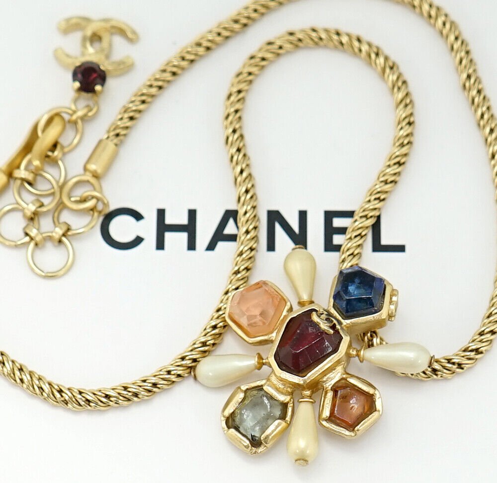 Chanel necklace logo.jpg