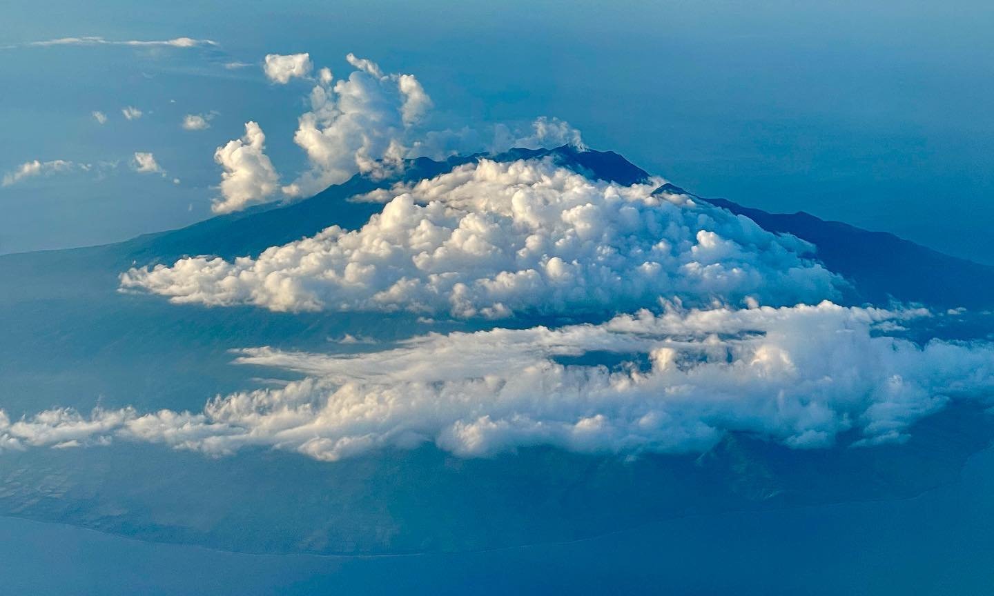 #Indonesia!! #volcanoes in the clouds on #sumbawa #sunset in #labuanbajo bay on #floresindonesia . And #marketfish &mdash; minutes out of the fishermen&rsquo;s boat. Kind of a tropical paradise.