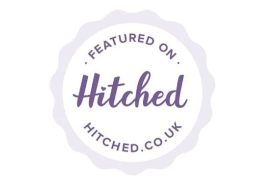 A circular badge with a scalloped edge that says "Featured on Hitch" and the website hitchd.co.uk.