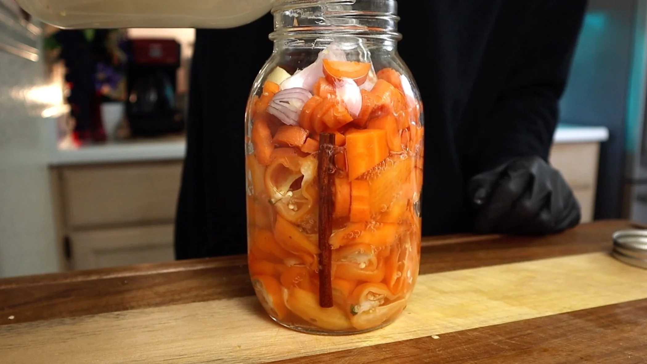 filling jar with salt water solution