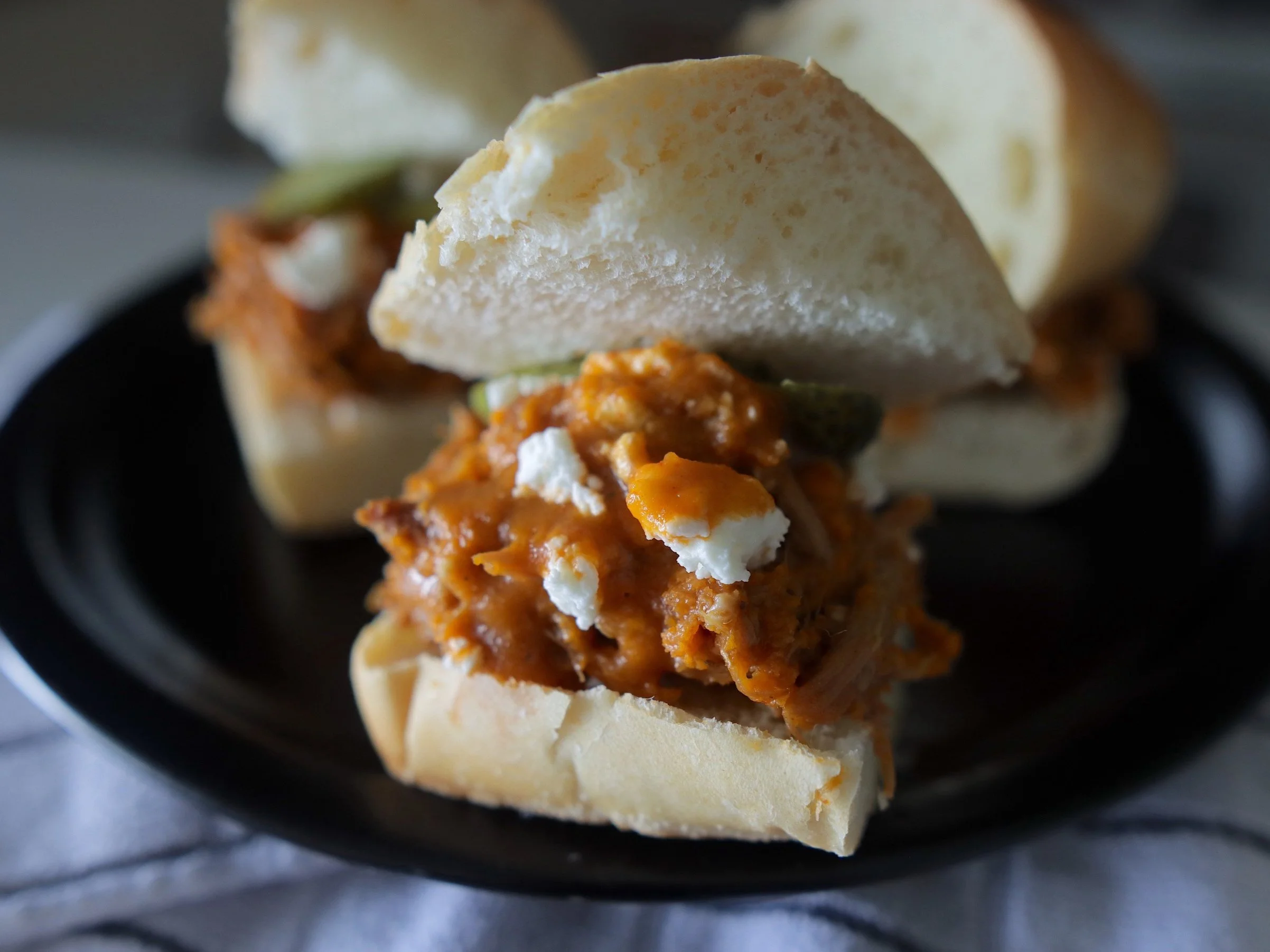plated bbq pork sandwiches