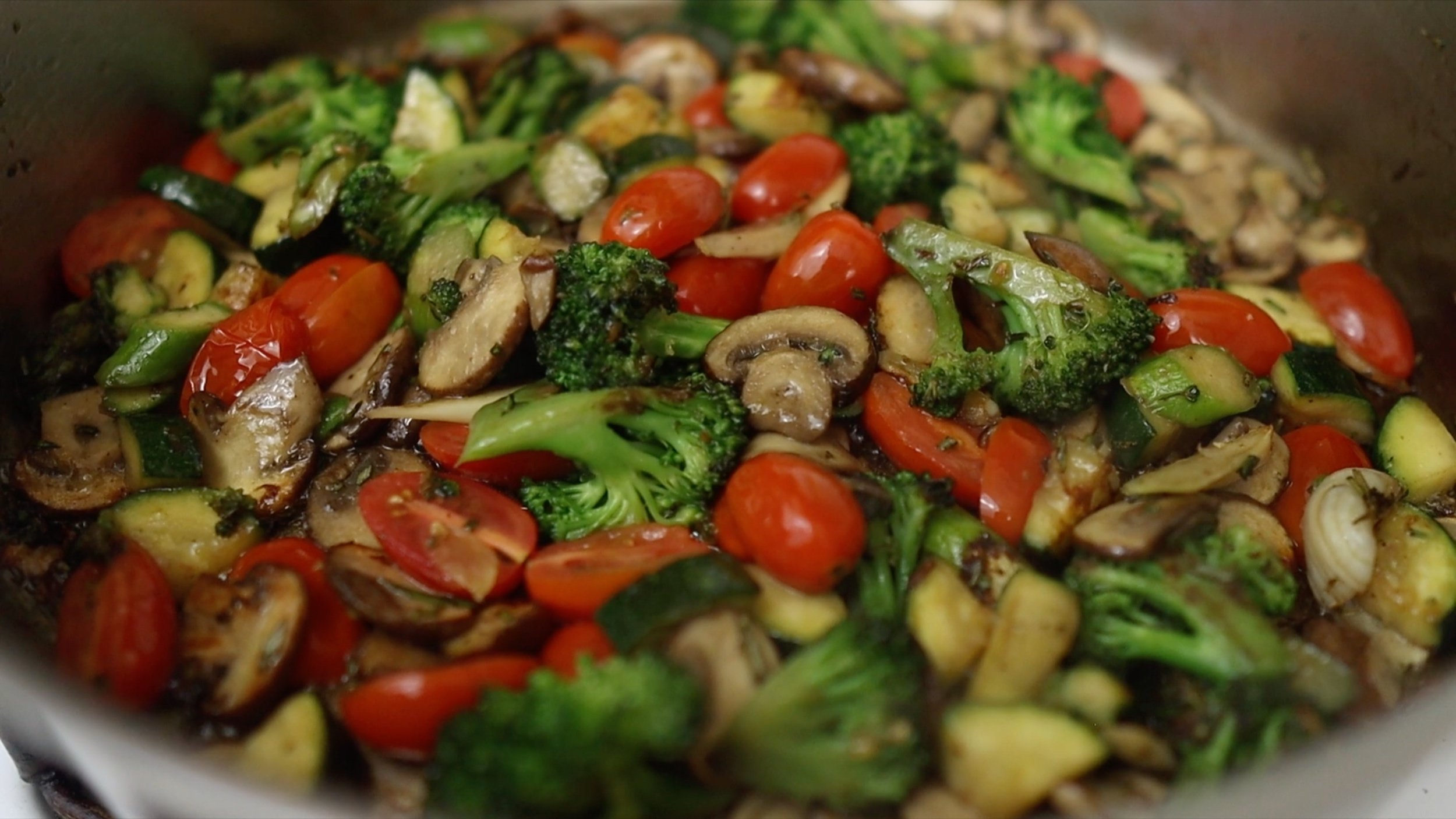 cooked veggies in saute pan