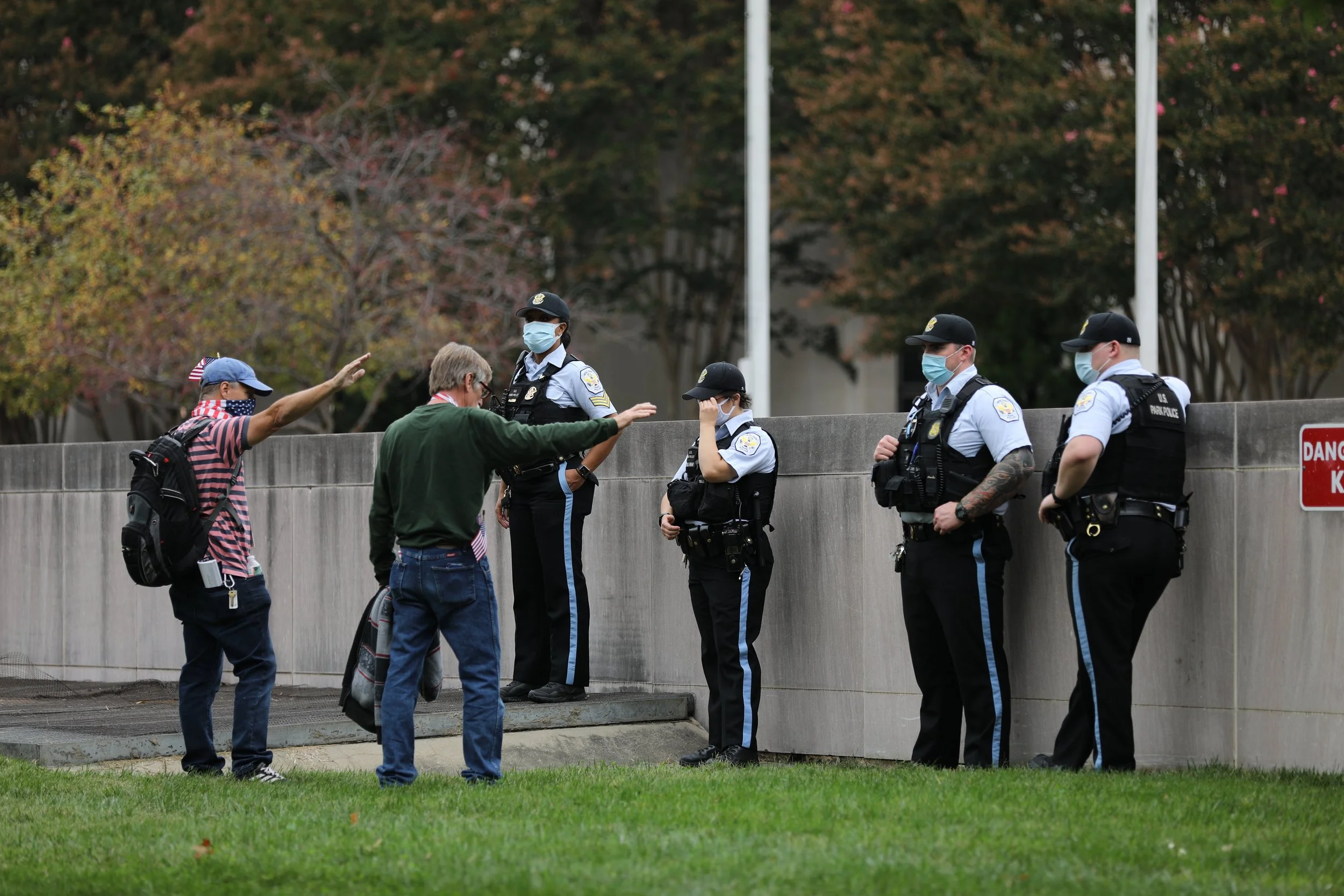 Gentlemen Praying over Police Officers.JPG