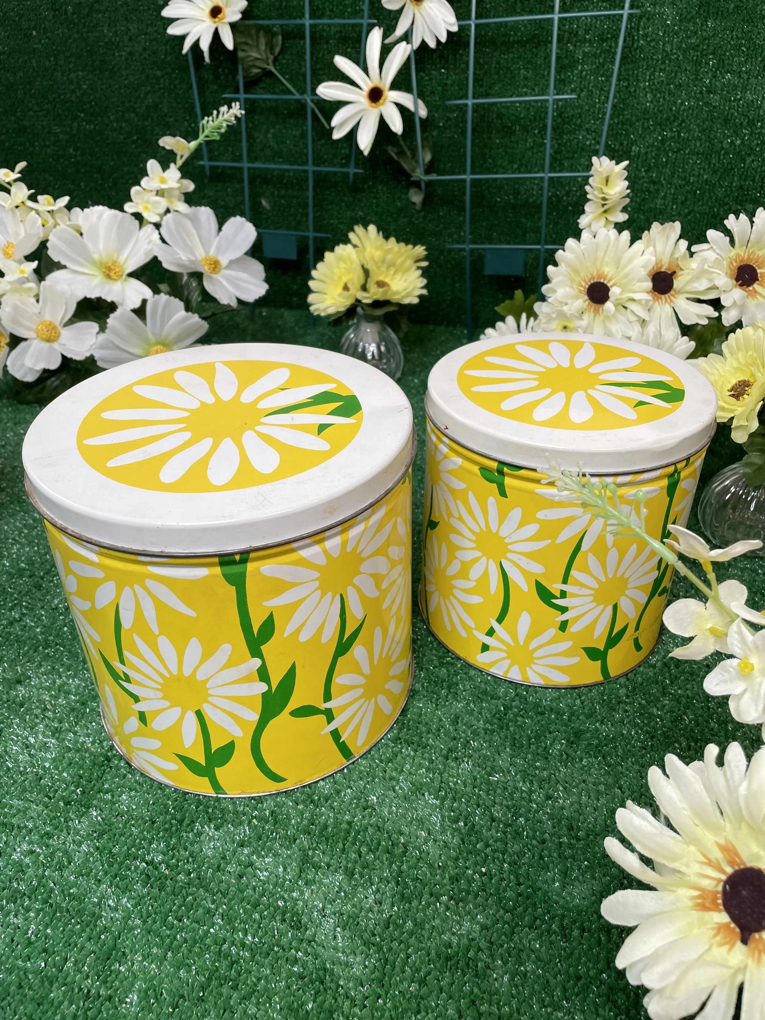 Set of two 1970’s yellow daisy tin containers