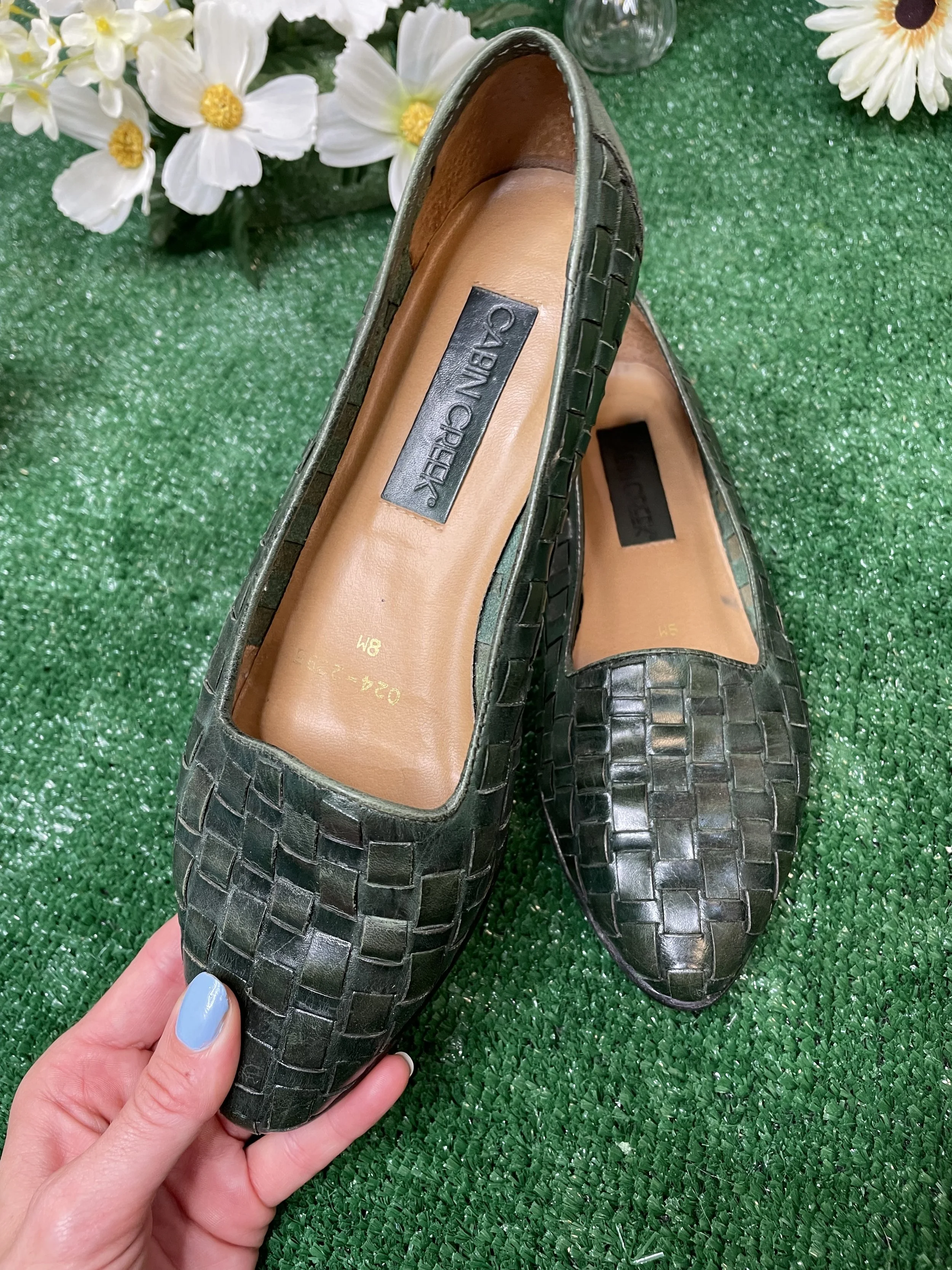 Green leather flats