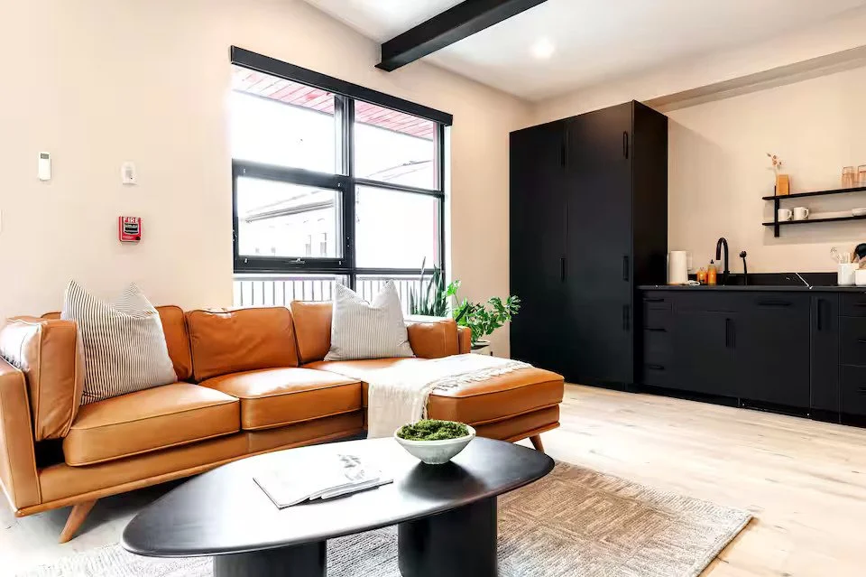Unit-1-couch-kitchen.jpg
