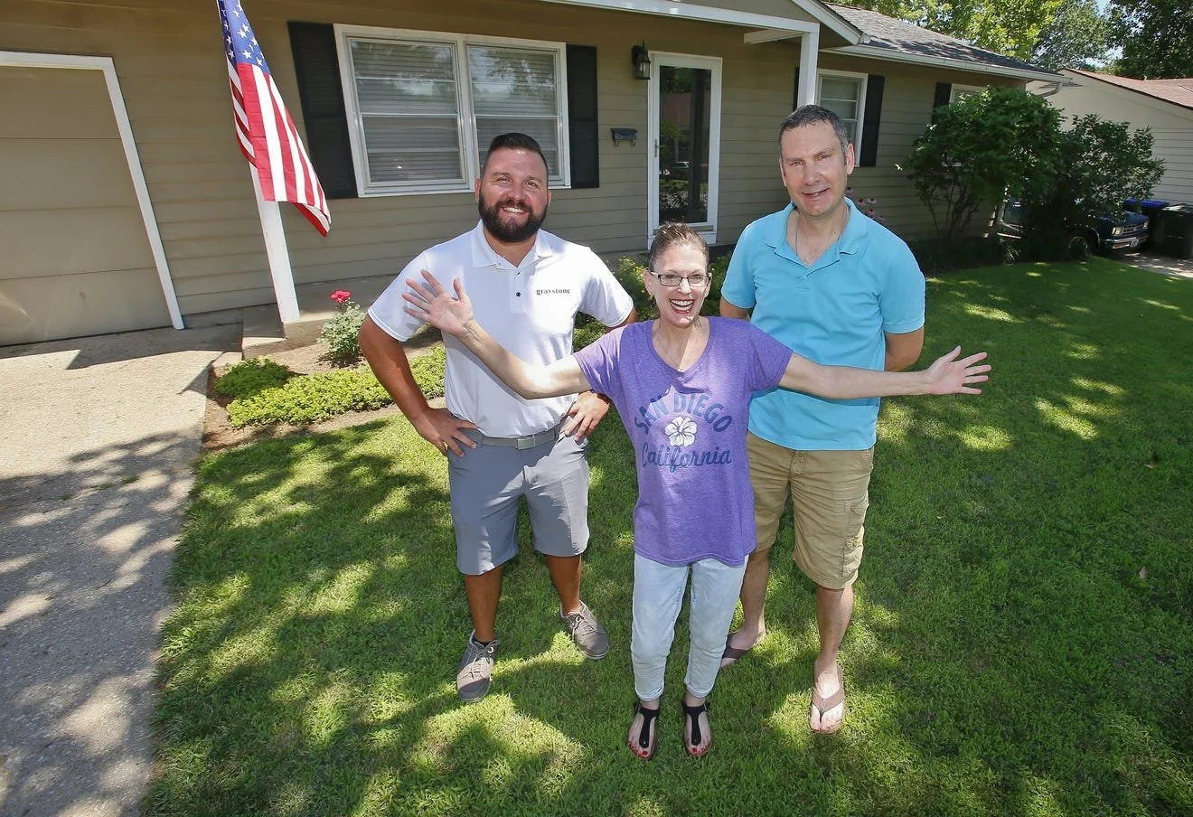 Image of Josh Barr Graystone Painting owner with community members outside their home in Topeka or Lawrence or Eudora Kansas