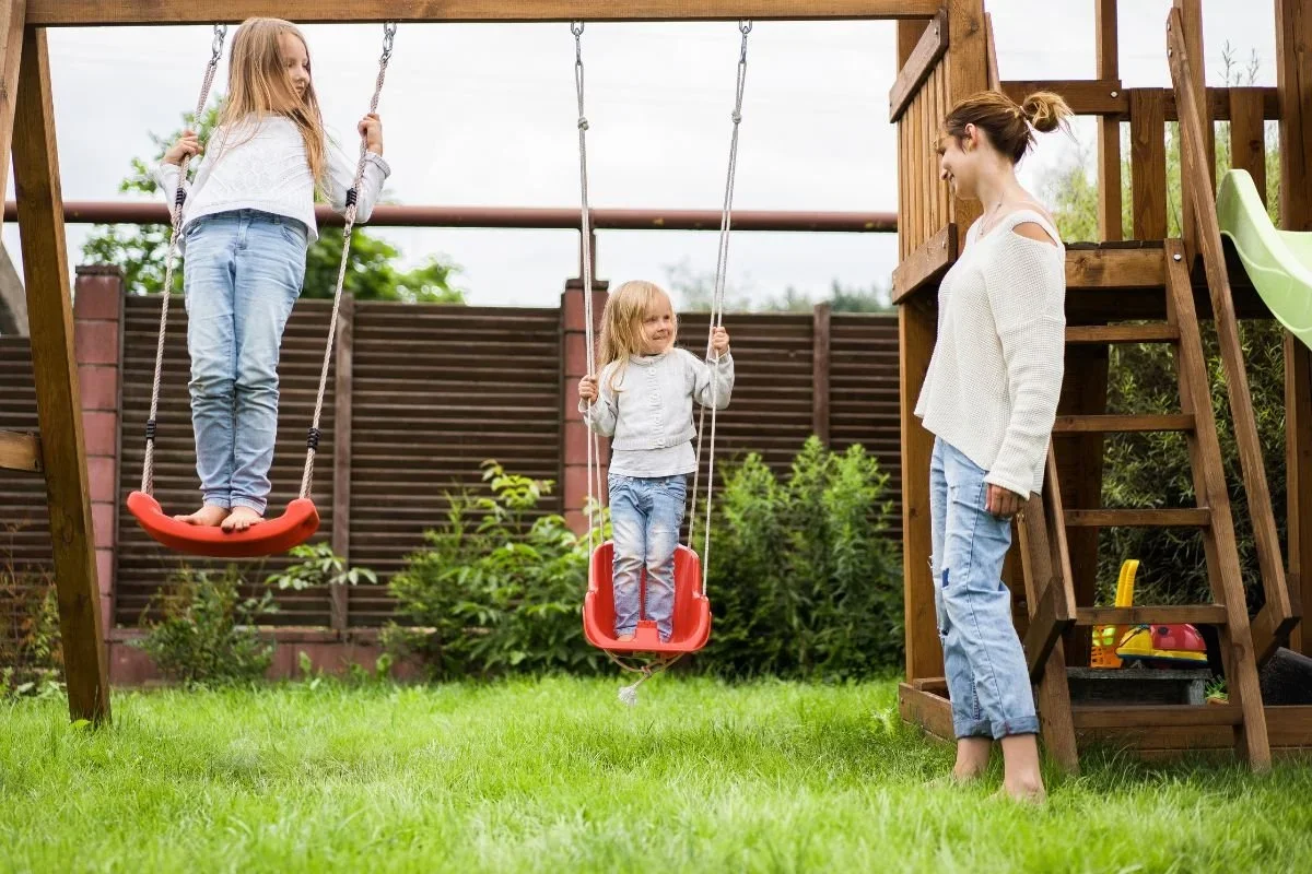 Children playing in yard after mosquito treatment
