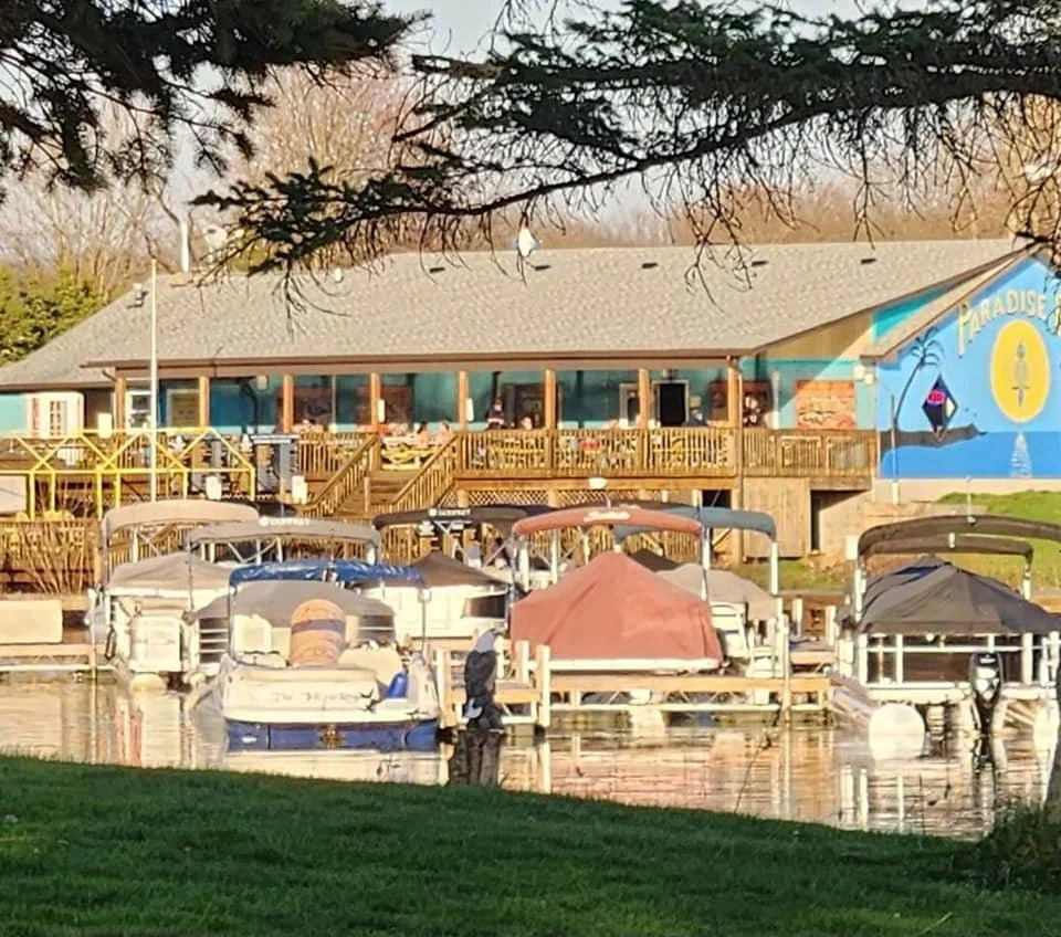 Roaming Rock Lake and lakefront homes in Roaming Shores Ohio representing local pest control services by Mosquito Assassin Pest Control