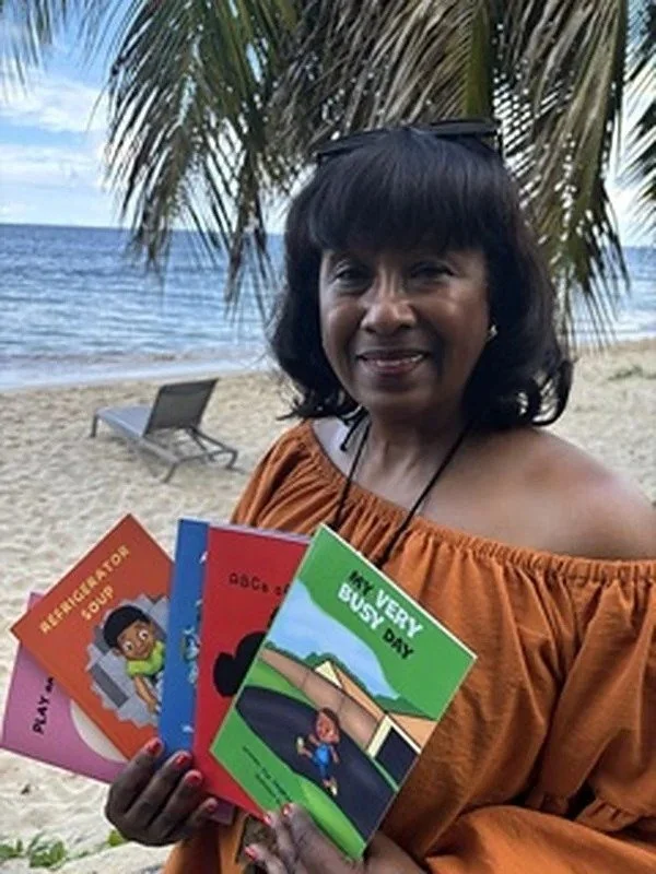 daphne-tillman-perry-with-her-childrens-books.jpg