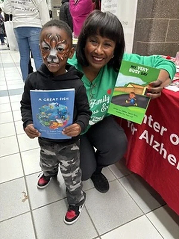 daphne-tillman-perry-with-a-young-fan.jpg