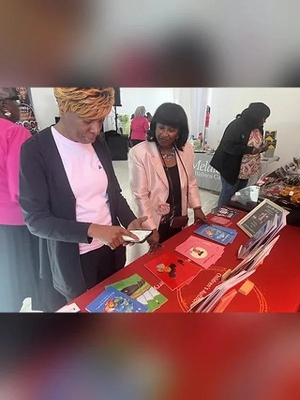 readers-at-daphne-tillman-perry-book-table.jpg