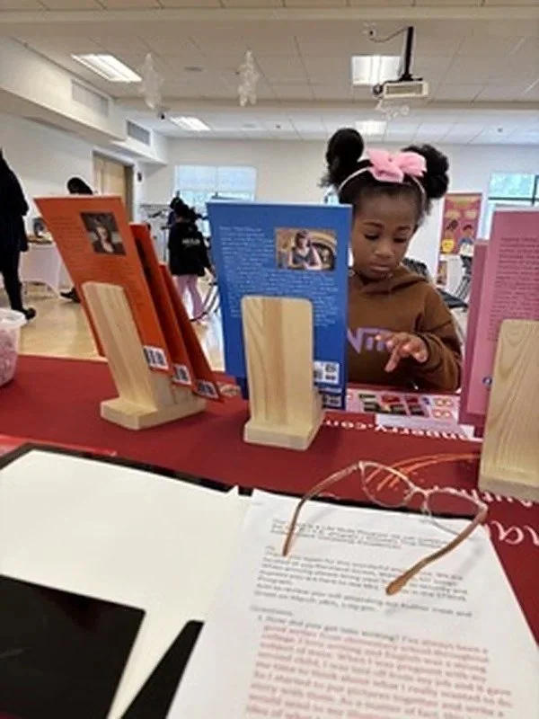 young-reader-at-a-book-display.jpg