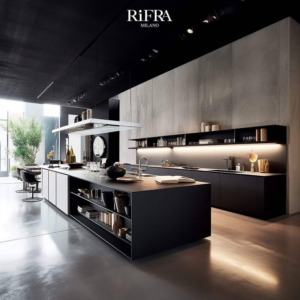 This Milan-style RiFRA kitchen is minimalist perfection. With its sleek Island in black cement, streamlined countertop, and light gray cement floor, this kitchen is a masterpiece of contemporary design. 

Graceful contemporary tapestries and an harmo