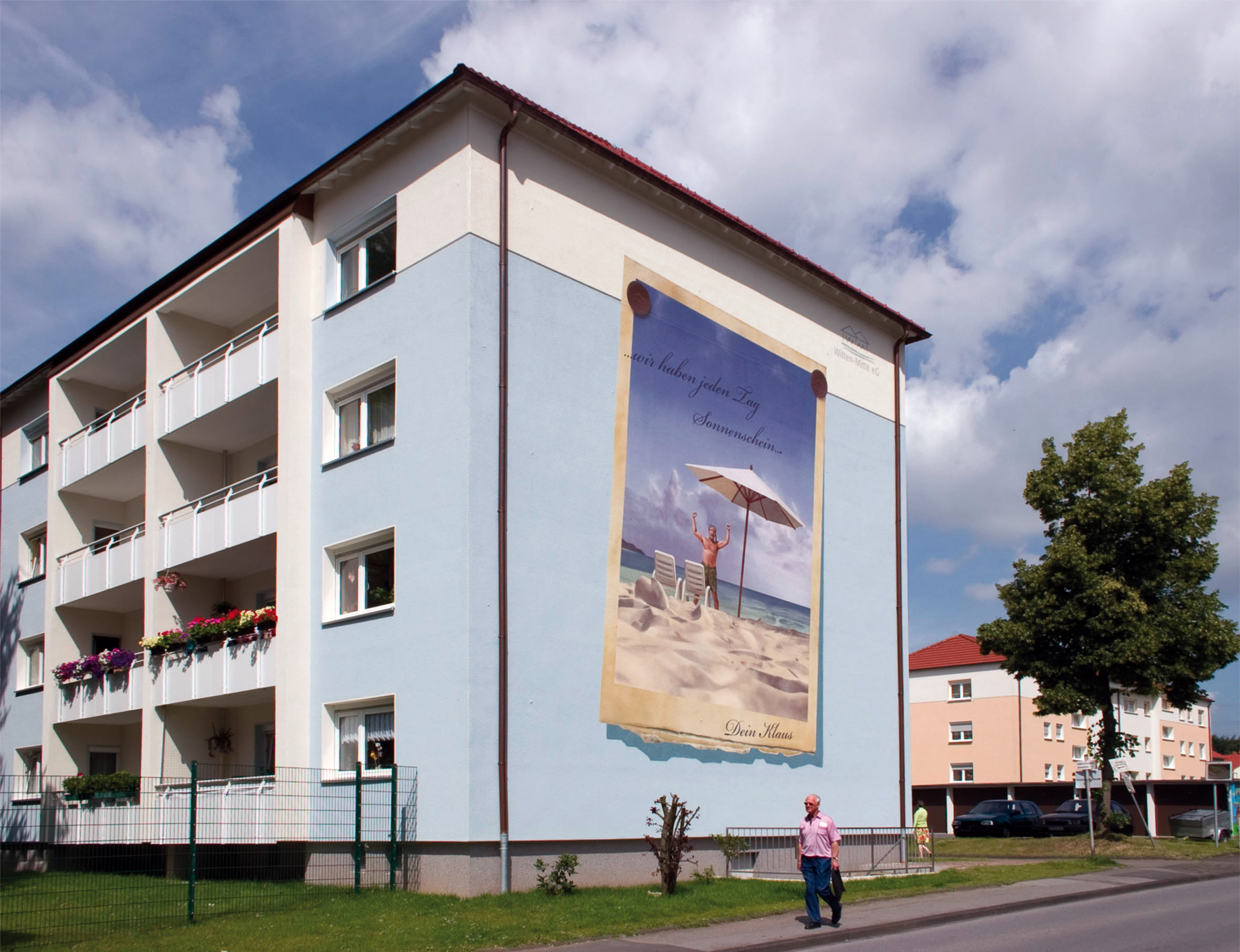 Fassadengestaltung-auf-Putz-brandmauer-wohbau-farbkonzept-reklame-wandbild-Beispiel.jpg