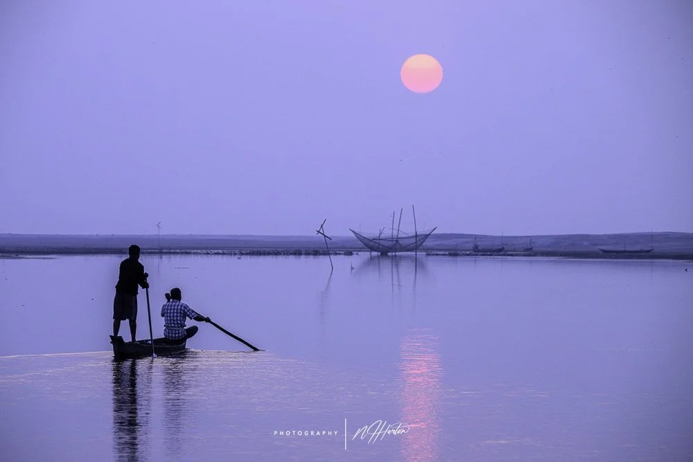 Man-looking-after-fishing-nets-Assam-India