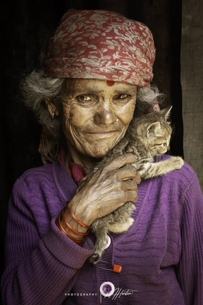 Portrait of lady with cat in Mustang, Nepal
