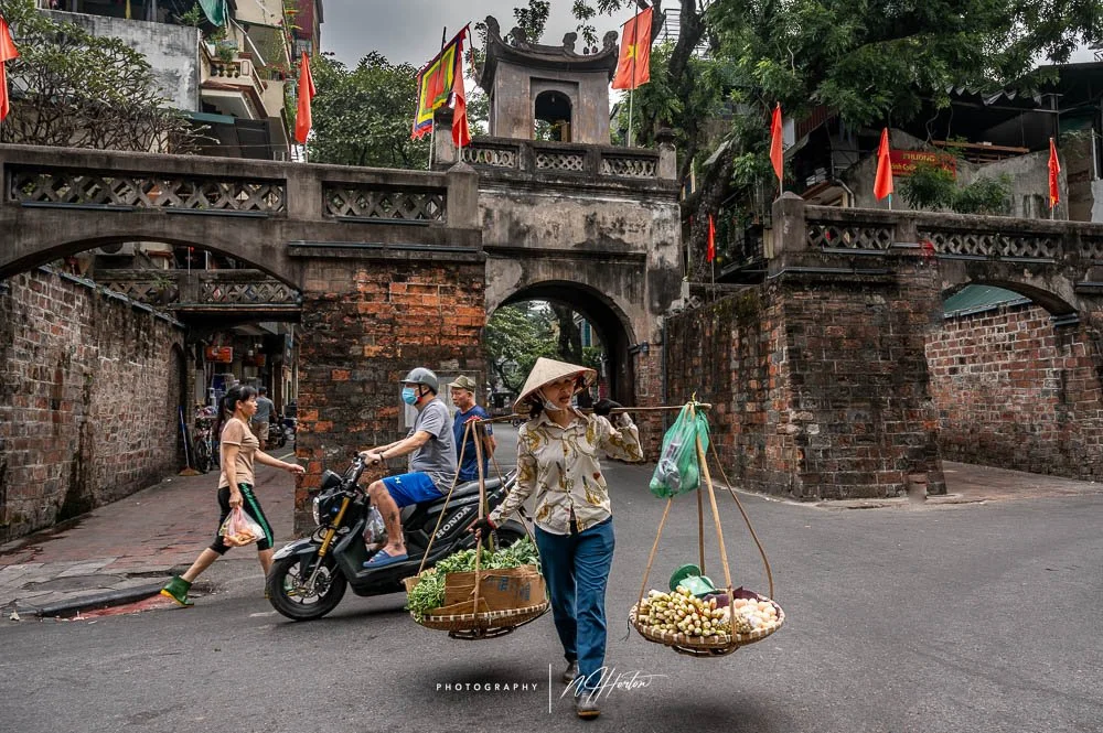 Ancient gate into Old Quarter,  Hanoi, North Vietnam.