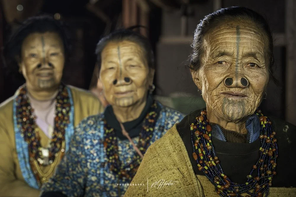 Three-Apatani-women-with-nose-plugs-Ziro-India.jpg