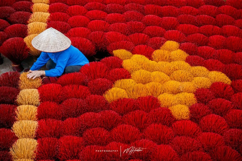 Incense sticks making Vietnamese flag near Hanoi, North Vietnam.