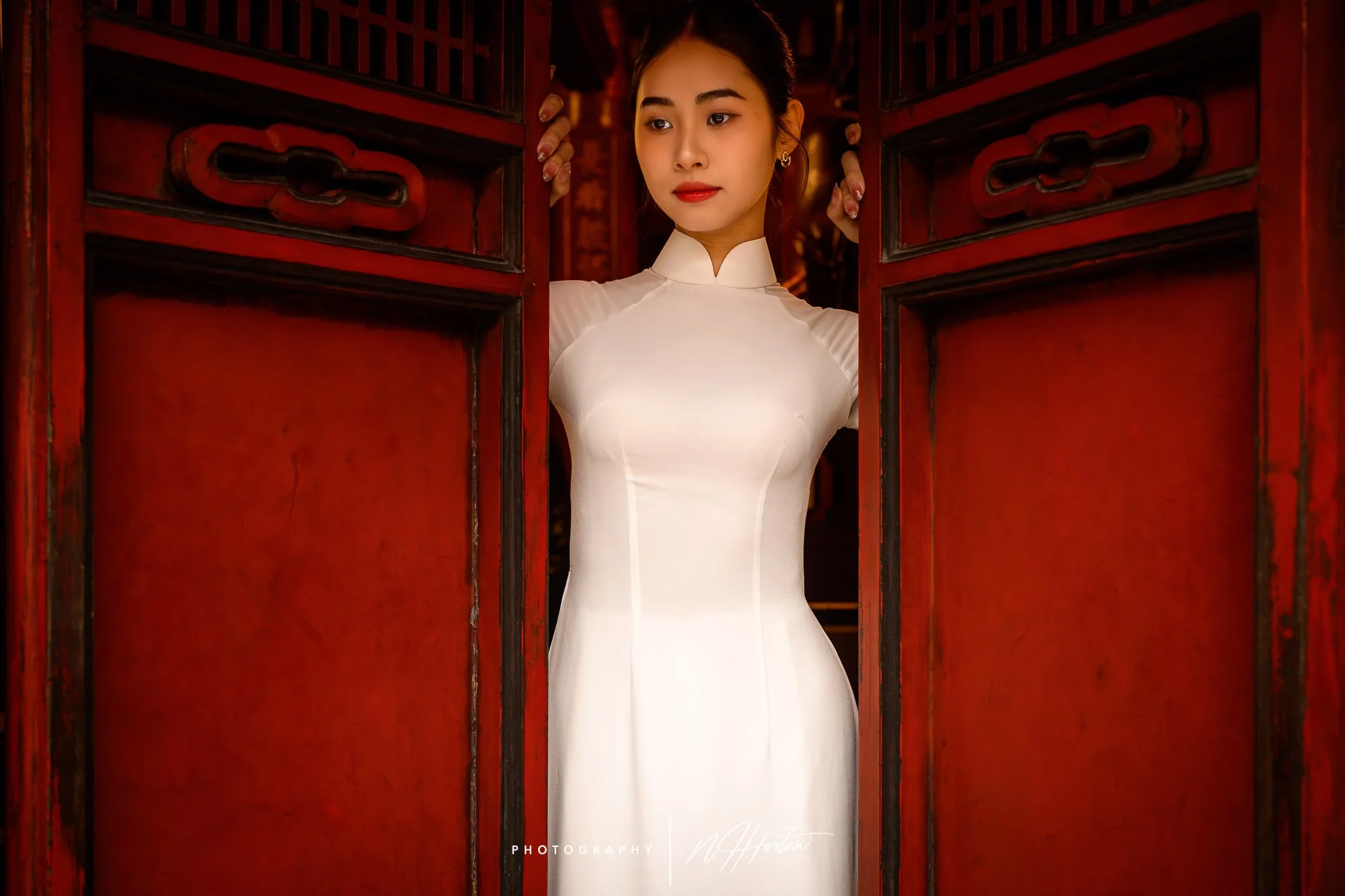 Red window at temple of literature, Hanoi, Vietnam.