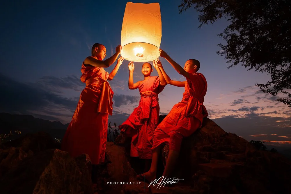 Monks at Mount Phousi Luang Prabang Laos.jpg