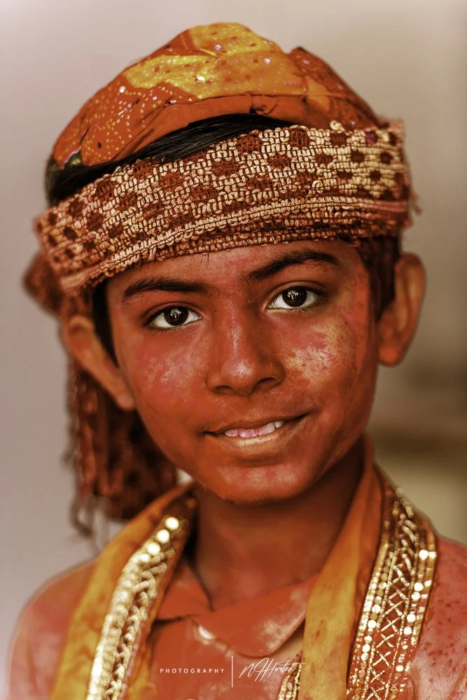 Boy-with-red-face-Holi-festival-India