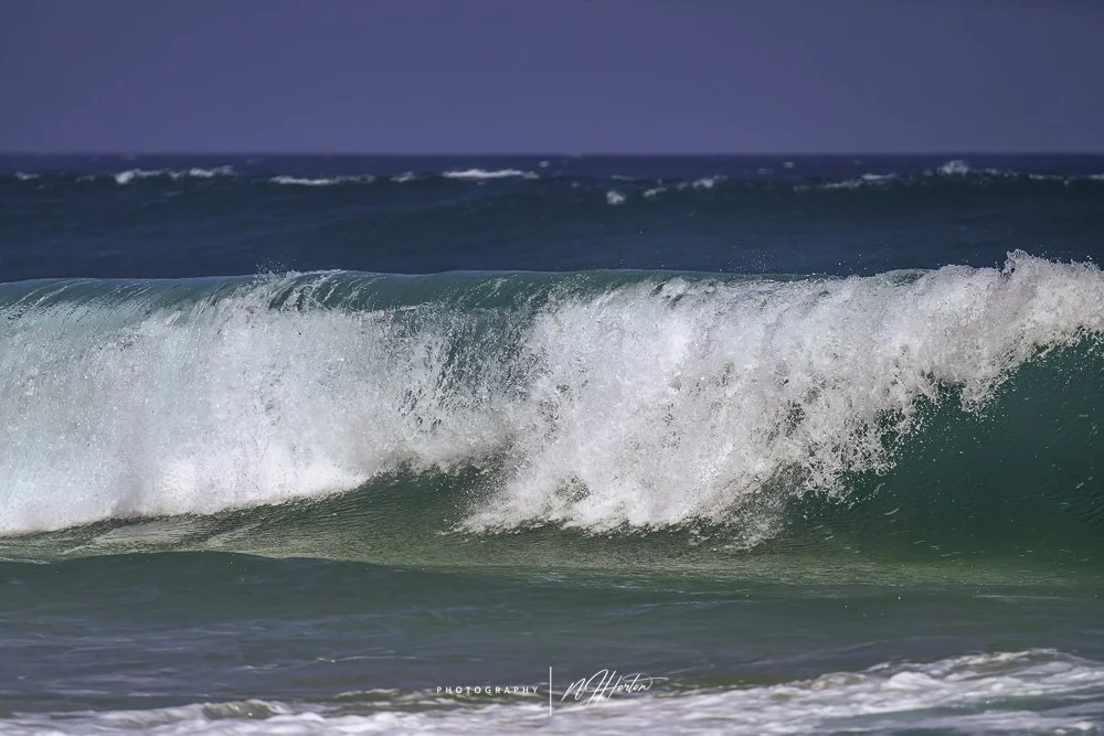 Wave breaking on surf beach, Sumba, Indonesia