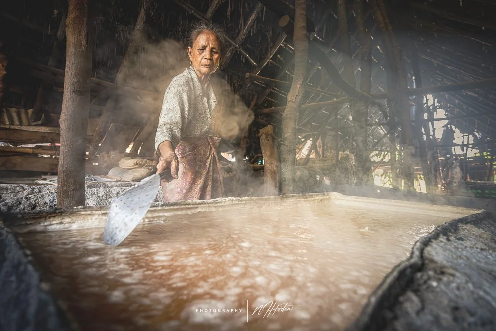 Boiling sea water for salt, Sumba, Indonesia