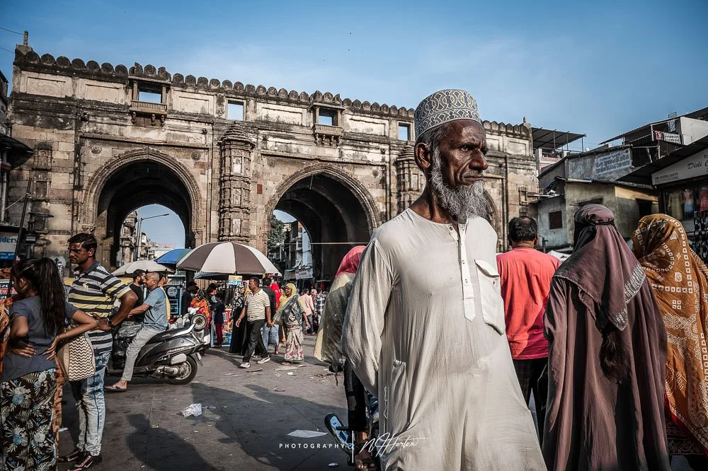 Man at city gates Ahmedabad, Gujarat, India.