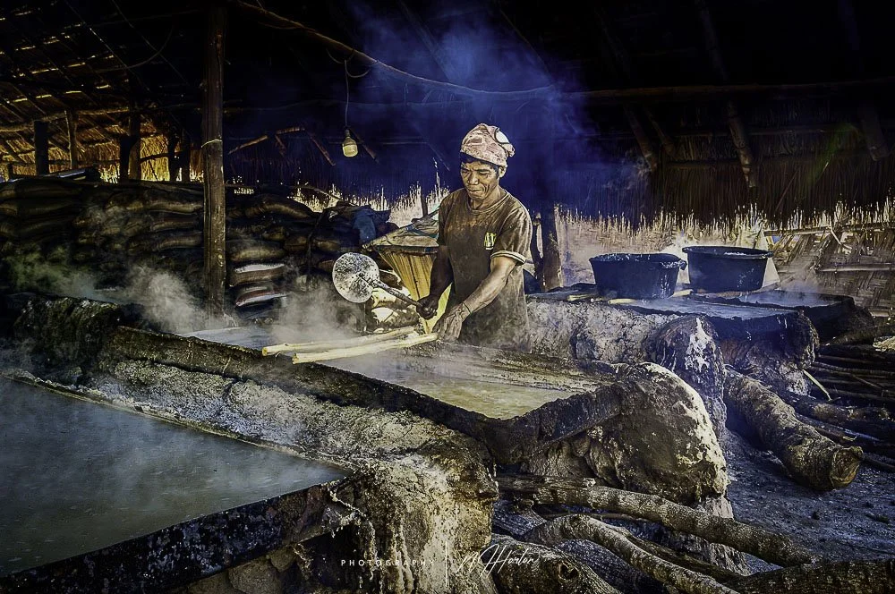 Boiling sea water for salt, Sumba, Indonesia